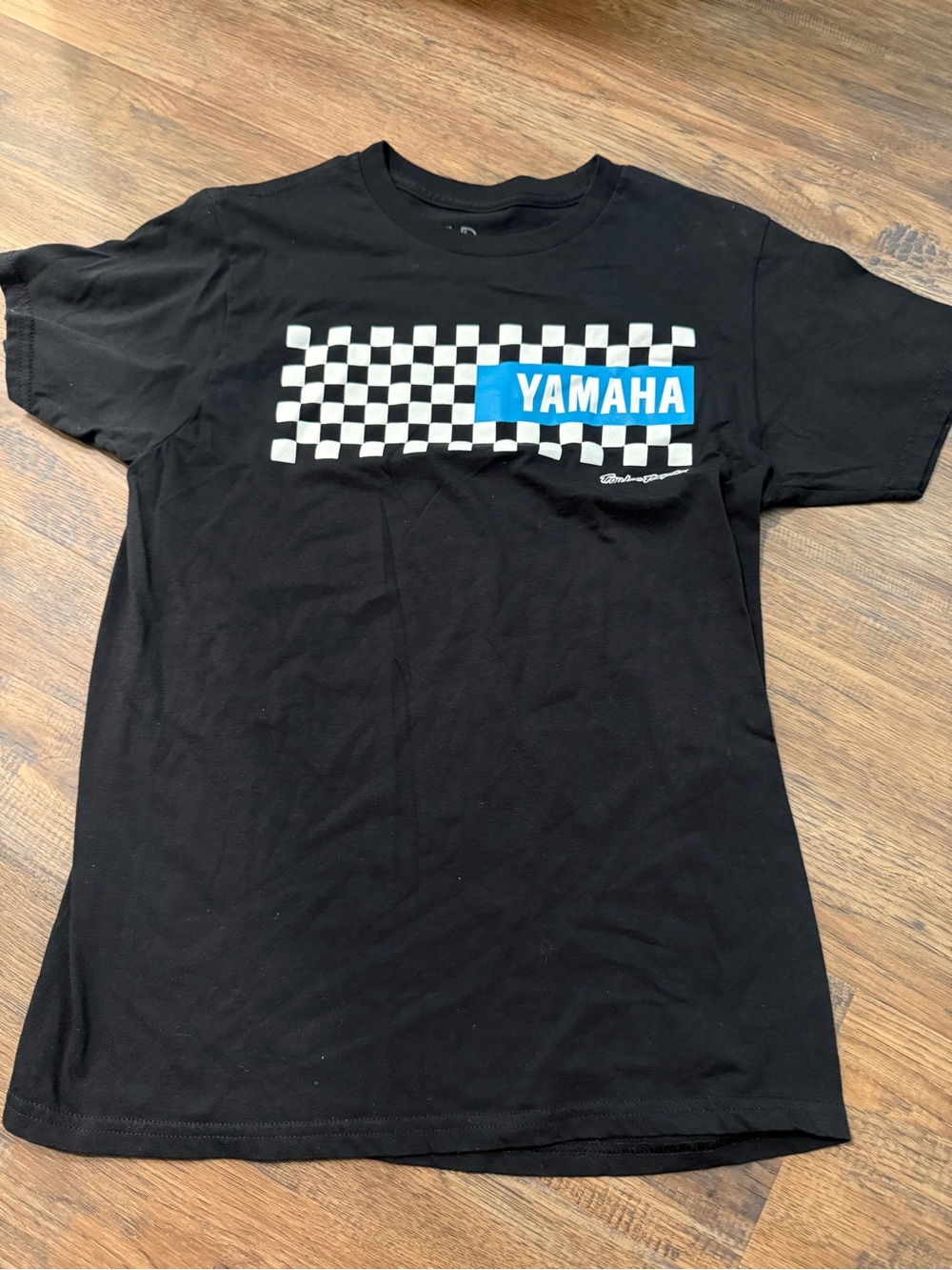Yamaha Black Tee with Blue Logo and White Checkerboard